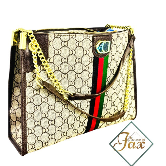 Women’s Tote Handbag | Brand New. Gold Tone Hardware And Quality Stitching . Several Compartments.Seriously the best handbag I ever owned. You can’t dirty it or break it. It carries everything.Looks super cool, and it’s better priced than anything like it
